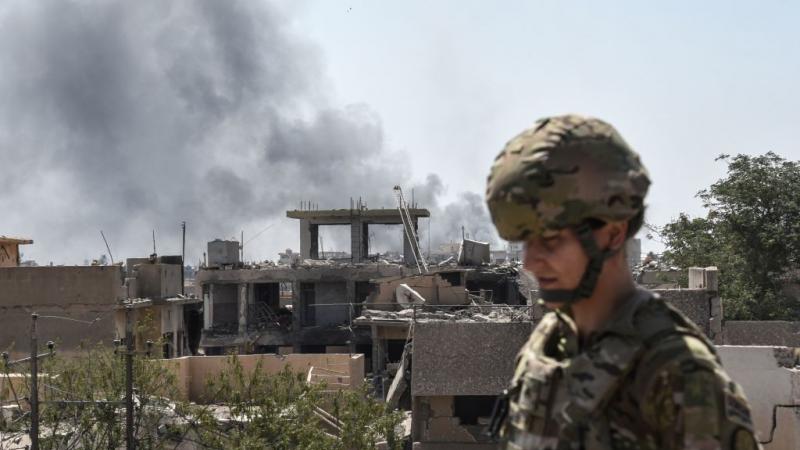 A U.S. soldier advising Iraqi forces in Mosul