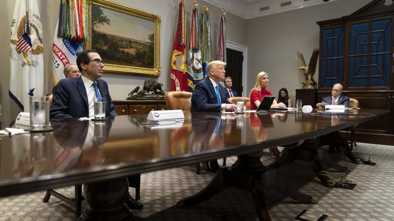 President Donald J. Trump, joined by Treasury Secretary Steven Mnuchin, Advisor to the President Ivanka Trump, and Director of the National Economic Council Larry Kudlow, participates in a video teleconference with banking executives