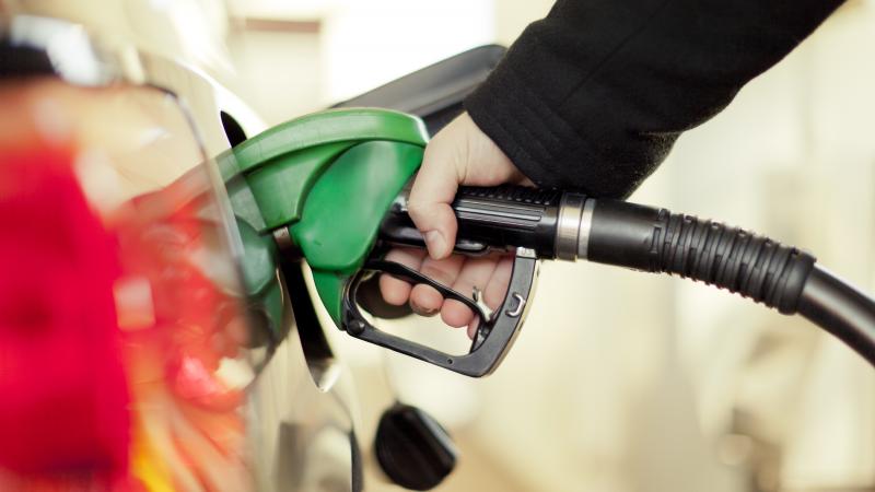 Consumer pumping gas
