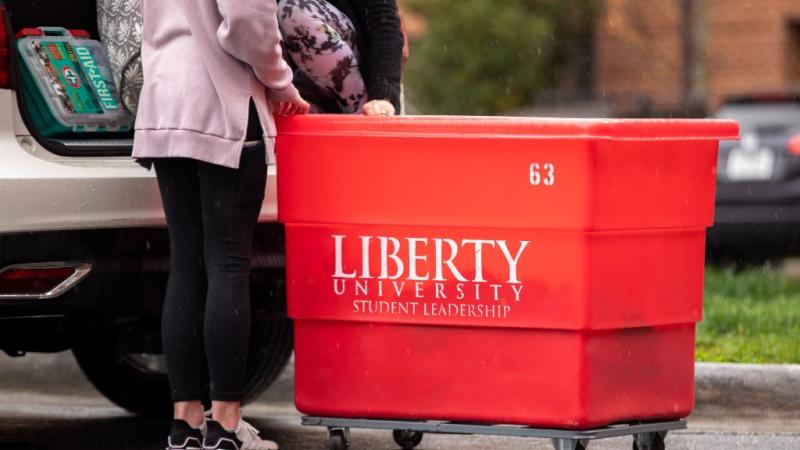 A student moves out of her dorm at Liberty University