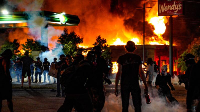 Protesters set afire the Wendy's where Brooks was killed