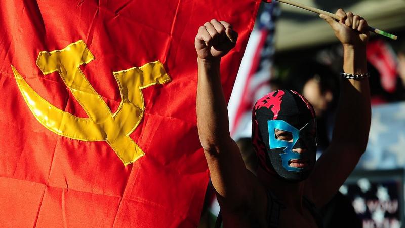 A participant in U.S. celebrations of May Day, 2013