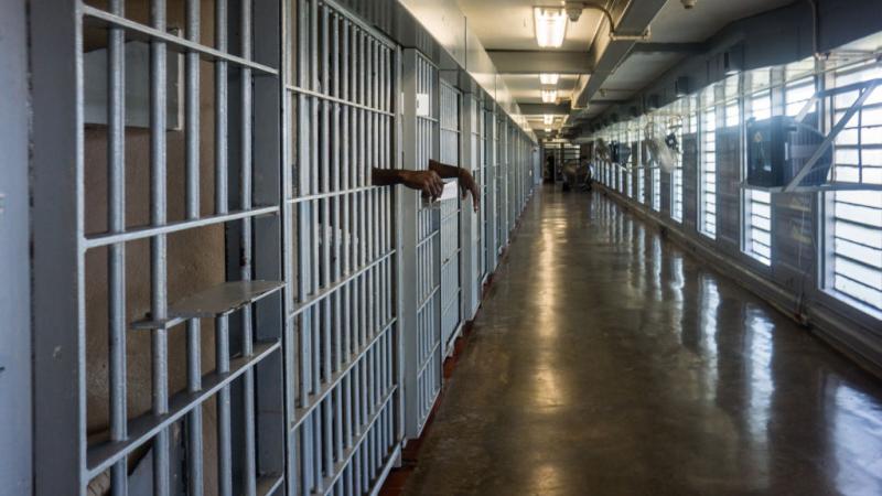 Prisoner's hands in punishment cell wing at Angola prison in Louisiana in 2013