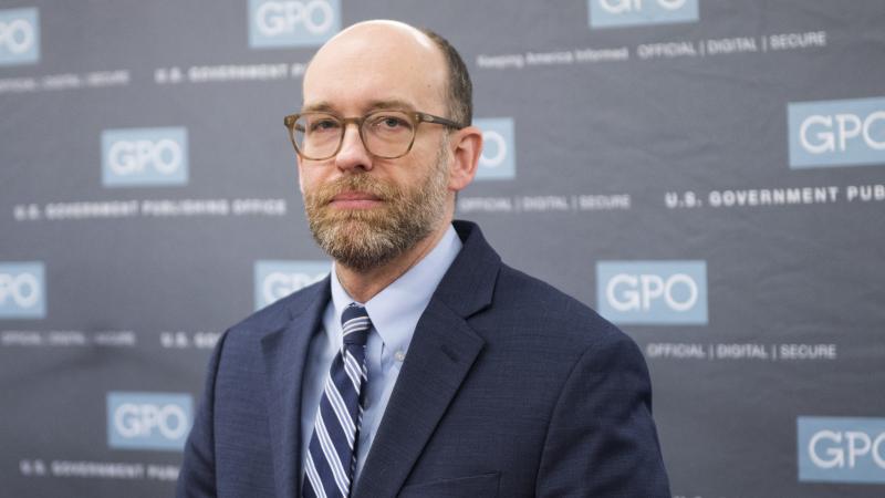  Acting OMB Director Russ Vought participates in a photo-op for the printing of President Donald Trumps budget for Fiscal Year 2020 at the Government Publishing Office in Washington on Thursday, March 7, 2019.
