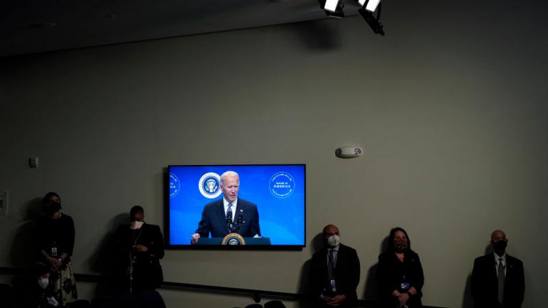 Joe Biden on a TV screen, Jan. 25
