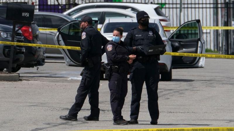 Police at the scene of the shooting, Apr. 16