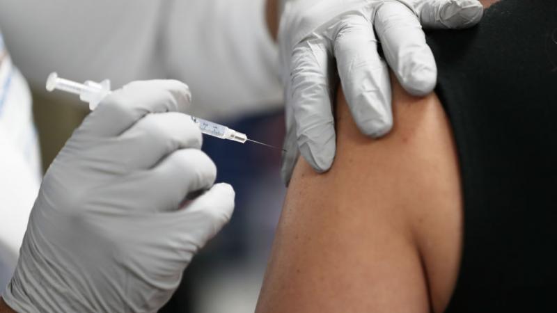 Person receiving COVID-19 vaccine in Florida in December 2020