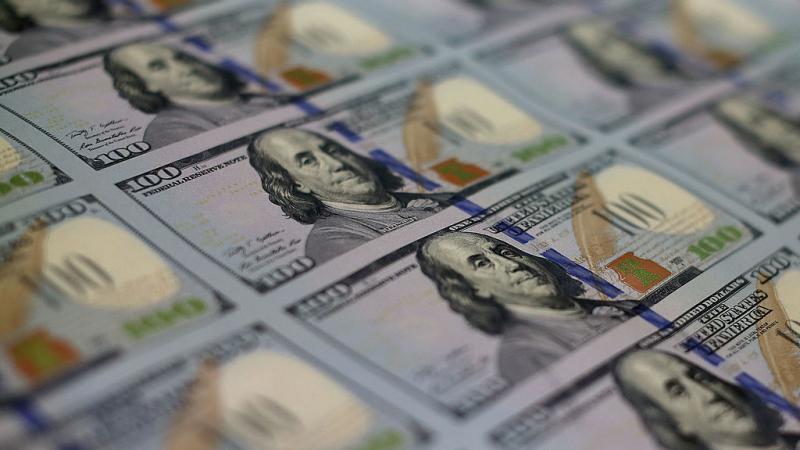 $100 notes at the Bureau of Engraving and Printing in Washington DC in 2013