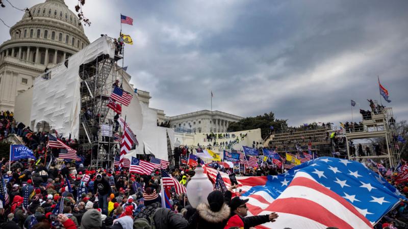 Trump supporters clash with authorities as people attempt to storm the Capitol on Jan. 6. 2021