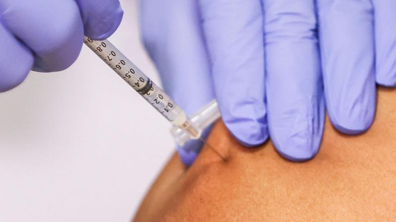 Medical staff at Howard University give COVID-19 vaccine doses for Hospital Staff Members on December 15, 2020 