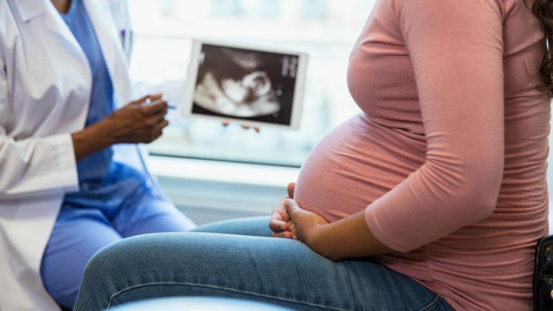 Pregnant woman, doctor, ultrasound