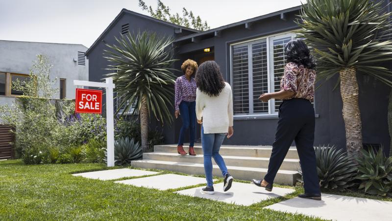 Home shoppers looking at a new home