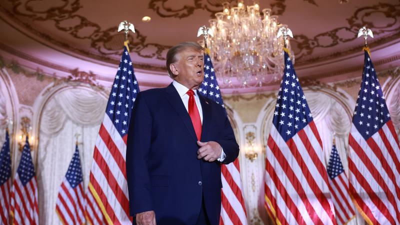 Donald Trump poses for photographs 