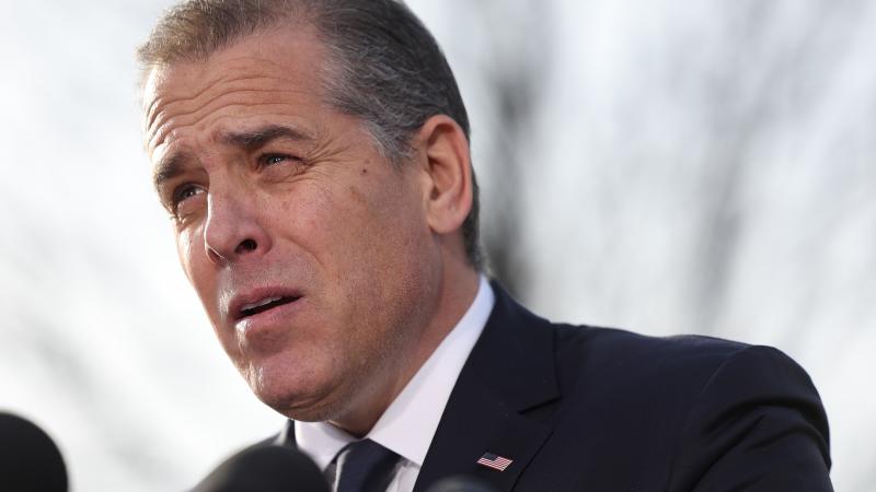 U.S. President Joe Biden's son Hunter Biden talks to reporters outside the U.S. Capitol on December 13, 2023 in Washington, DC. Hunter Biden defied a subpoena from Congress to testify behind closed doors ahead of a House vote on an impeachment inquiry against his father.