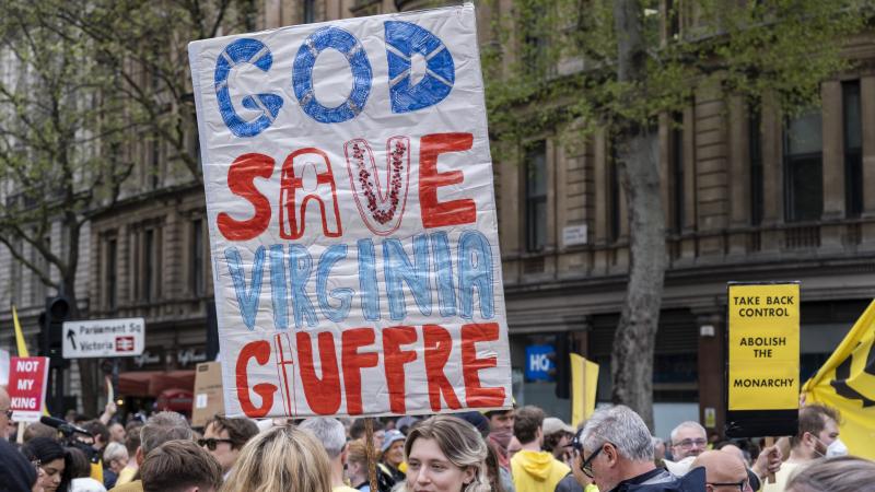 Anti-monarchists from the group Republic gather in central London to protest against the Coronation of King Charles III, one carrying. aplacard reading 'God Save Virginia Giuffre' on 6th May 2023 in London, United Kingdom