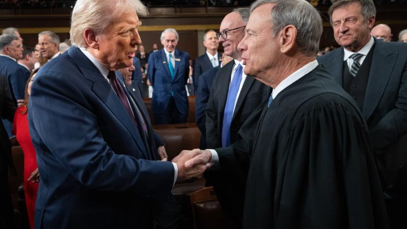 President Donald Trump and Supreme Court Justice John Roberts