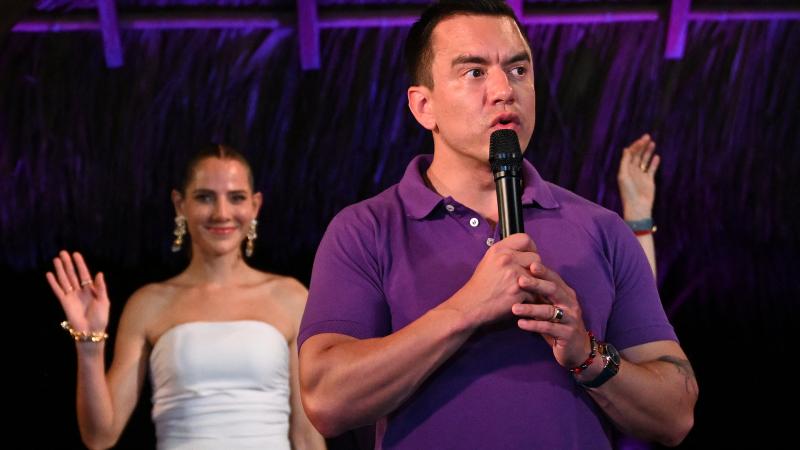 Ecuador's President and Presidential candidate Daniel Noboa talks to supporters next to his wife Lavinia Valbonesi in Olon, Santa Elena province, Ecuador on April 13, 2025.