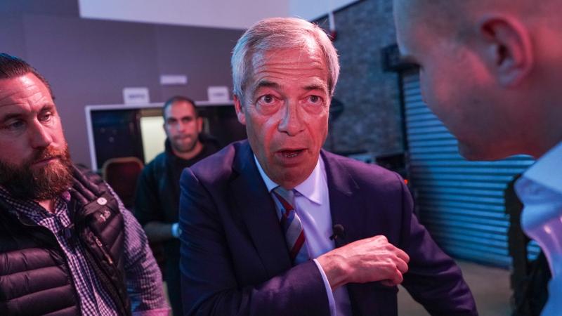 Reform UK party leader Nigel Farage is seen celebrating with supporters after Reform UK took control of Durham County Council after winning more than half of the seats on May 02, 2025 in Durham, England. 