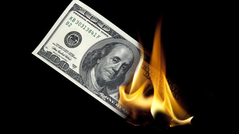 Burning one hundred dollar 