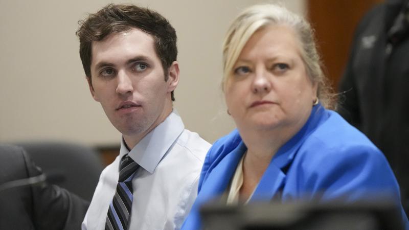 Tyler Robinson, accused in the fatal shooting of Charlie Kirk, sits beside defense attorney Kathryn Nester during a hearing in Fourth District Court on Jan. 16 in Provo, Utah.