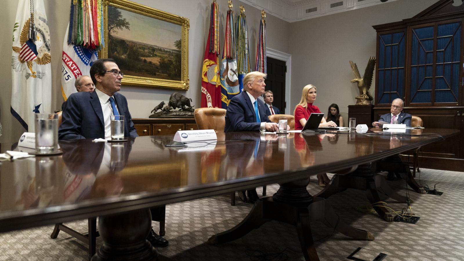 President Donald J. Trump, joined by Treasury Secretary Steven Mnuchin, Advisor to the President Ivanka Trump, and Director of the National Economic Council Larry Kudlow, participates in a video teleconference with banking executives