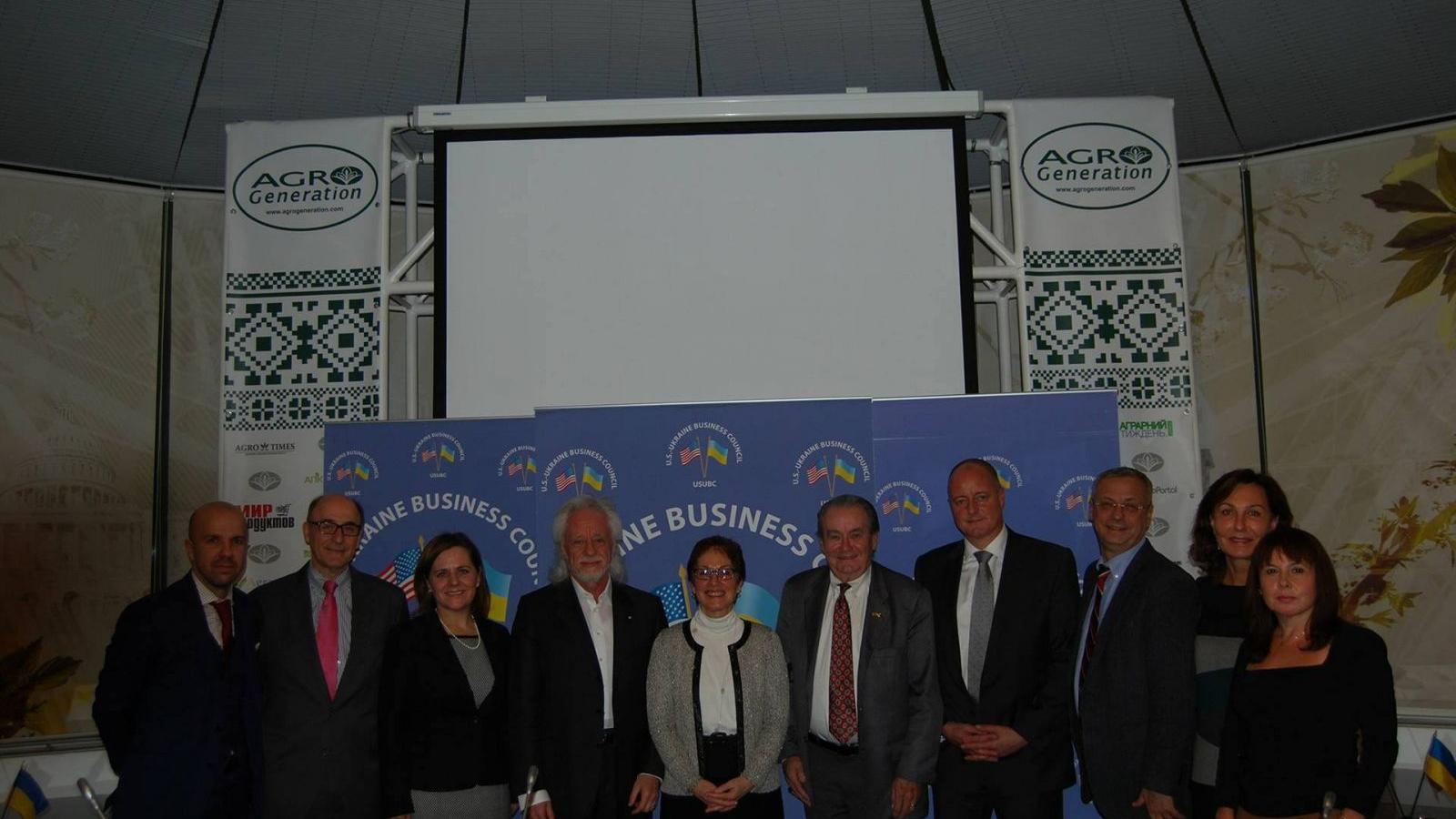 Ambassador Yovanovitch (center) is photographed at a US-Ukraine Business Council Event with Vadim Pozharksyi (far left) (Nov. 7, 2017).