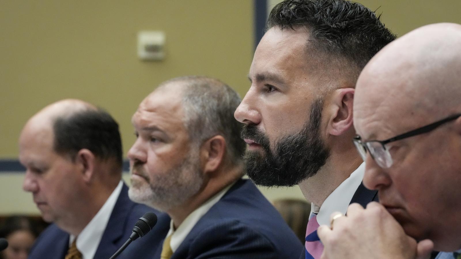 WASHINGTON, DC - JULY 19: (L-R) Flanked by their counsel, Supervisory IRS Special Agent Gary Shapley and IRS Criminal Investigator Joseph Ziegler testify during a House Oversight Committee hearing related to the Justice Department's investigation of Hunter Biden, on Capitol Hill July 19, 2023 in Washington, DC. The committee heard testimony from two whistleblowers from the Internal Revenue Service who allege that the Hunter Biden criminal probe was mishandled by the Department of Justice.