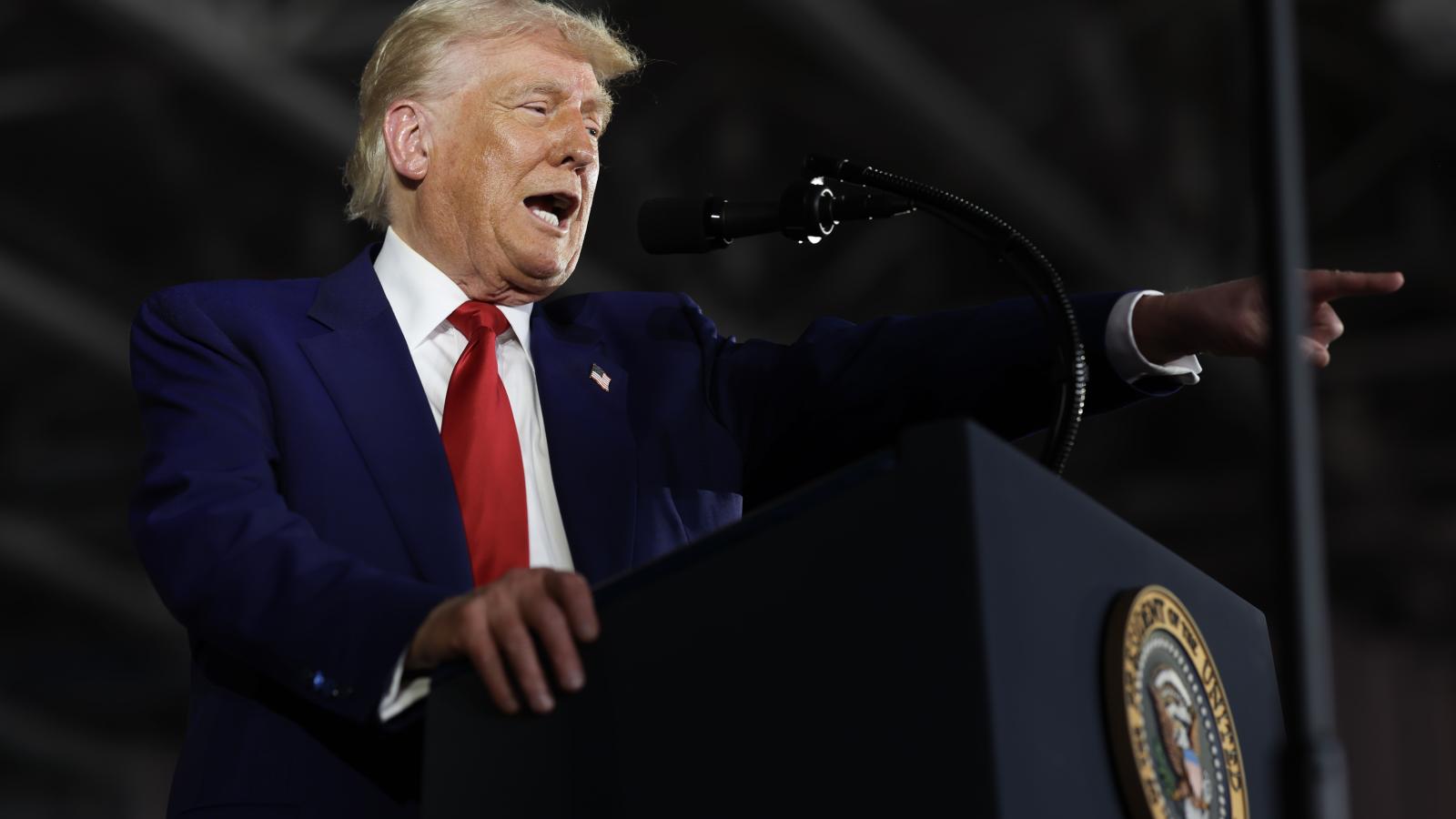  President Donald Trump speaks during a rally at Macomb Community College on April 29, 2025 at Warren, Michigan. Trump held the rally to highlight his accomplishments during his first 100 days in office, including closing the border, job creation and the economy