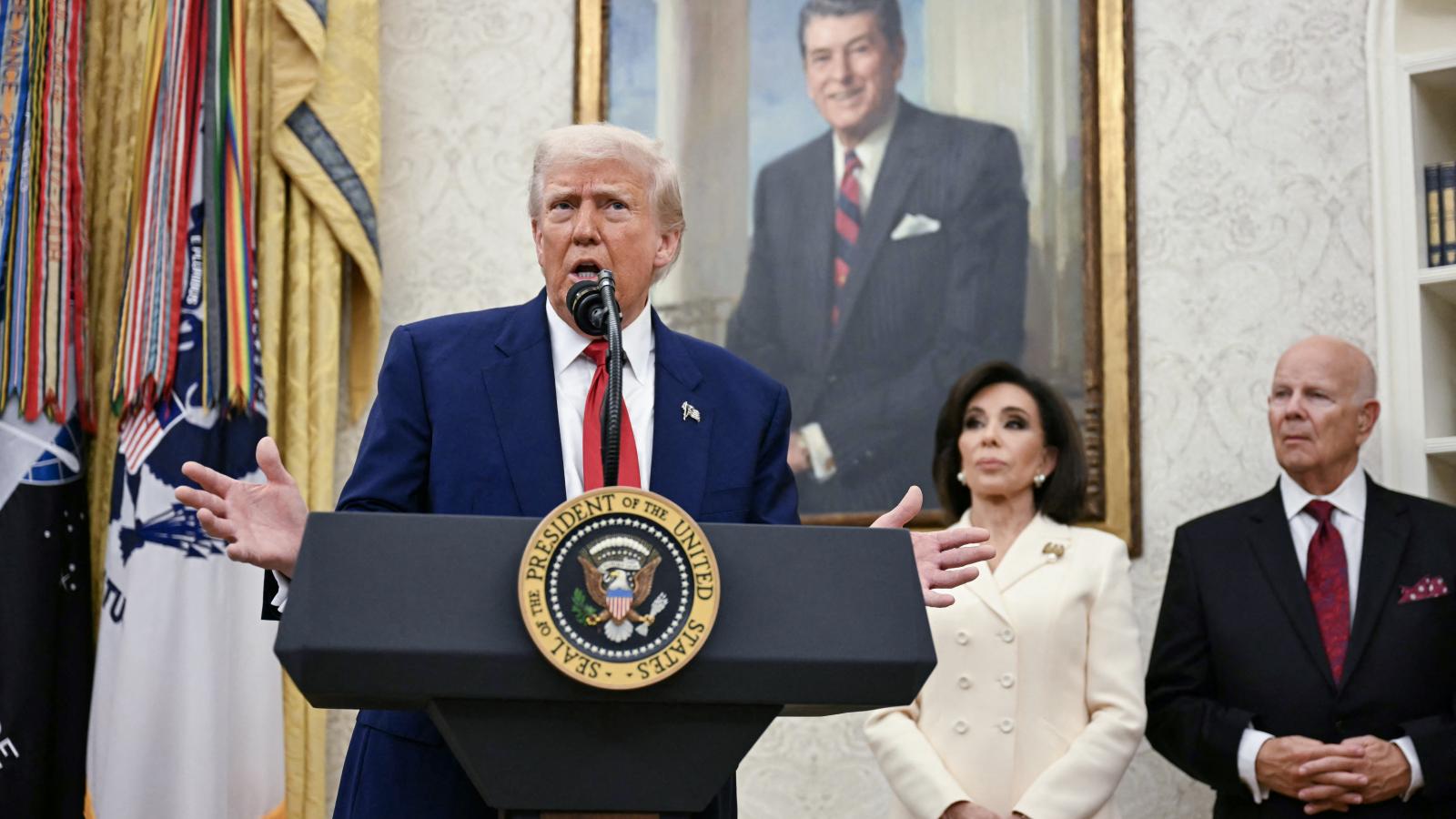 US President Donald Trump speaks during a swearing in ceremony for interim US Attorney for the District of Columbia Jeanine Pirro (2ndR) in the Oval Office of the White House in Washington, DC, on May 28, 2025. 